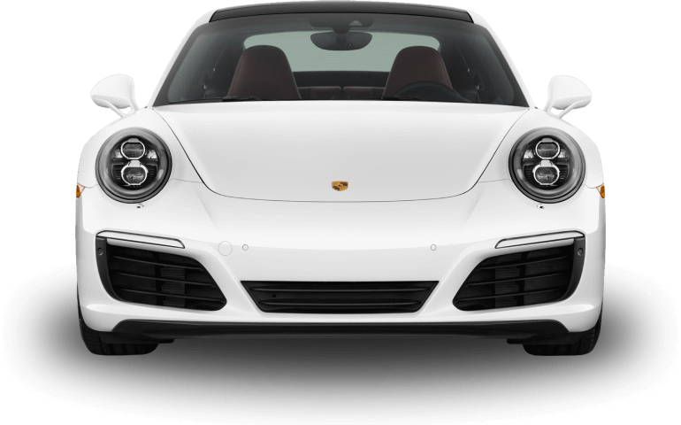 Front view of a white Porsche 911 sports car with sleek headlights and a low aerodynamic profile.