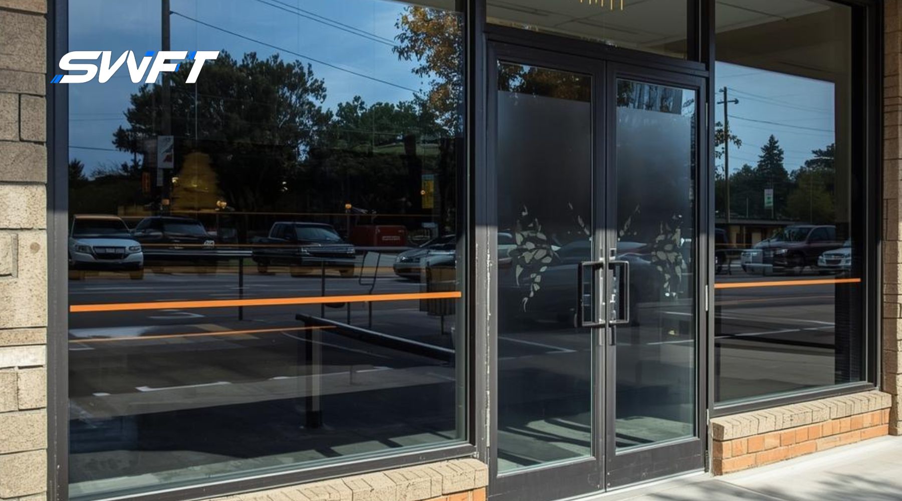Commercial storefront in Fort Myers with security window film installed on glass doors and windows, showing reinforced glass protection for business properties.